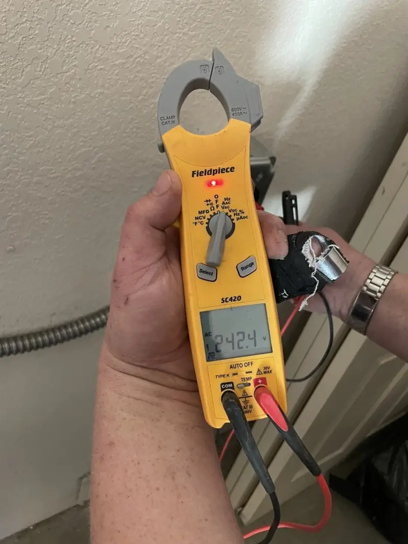 Voltage testing with clamp meter during Electrical Installation Services in College Park